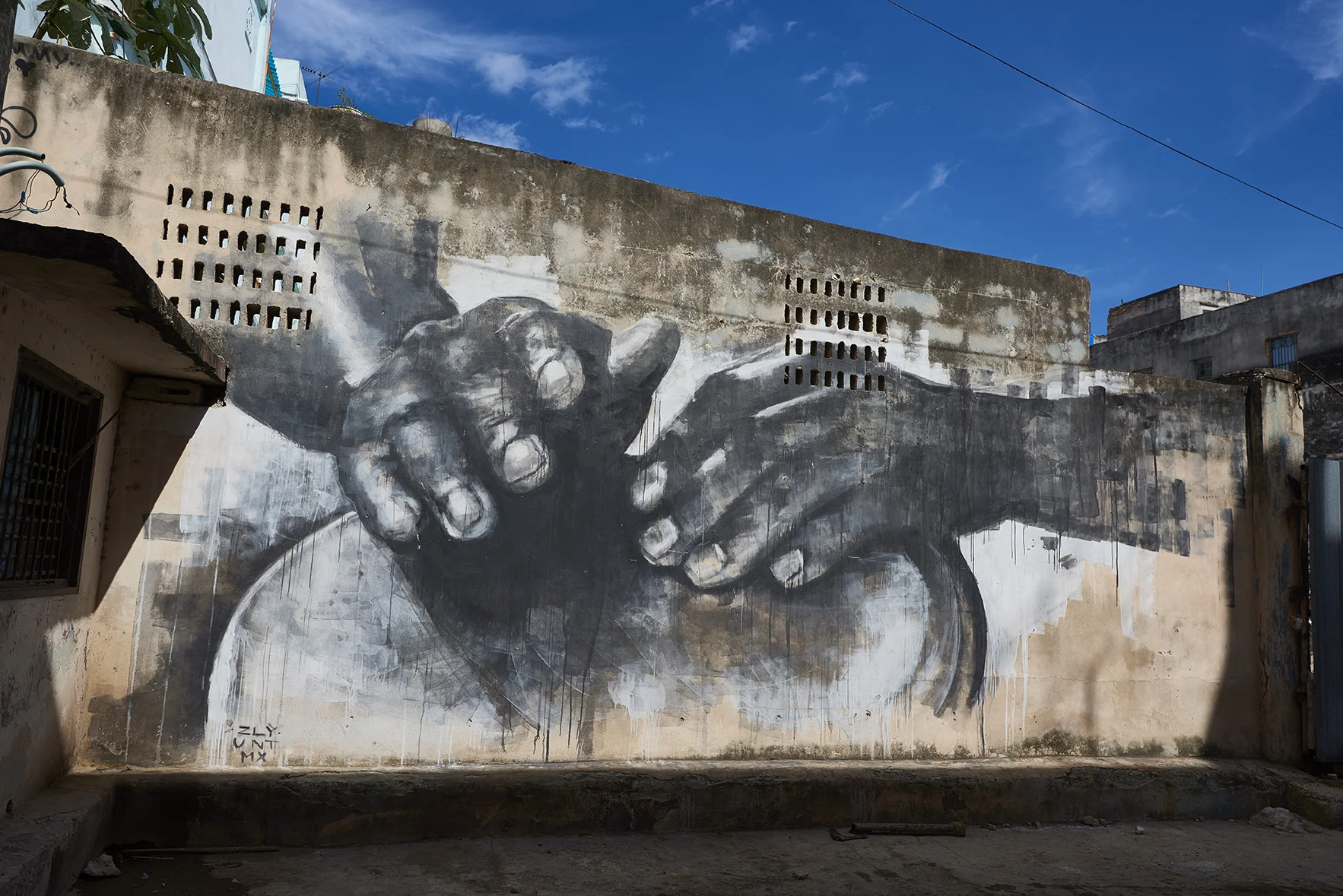 Large painted wall mural in Cuba. 