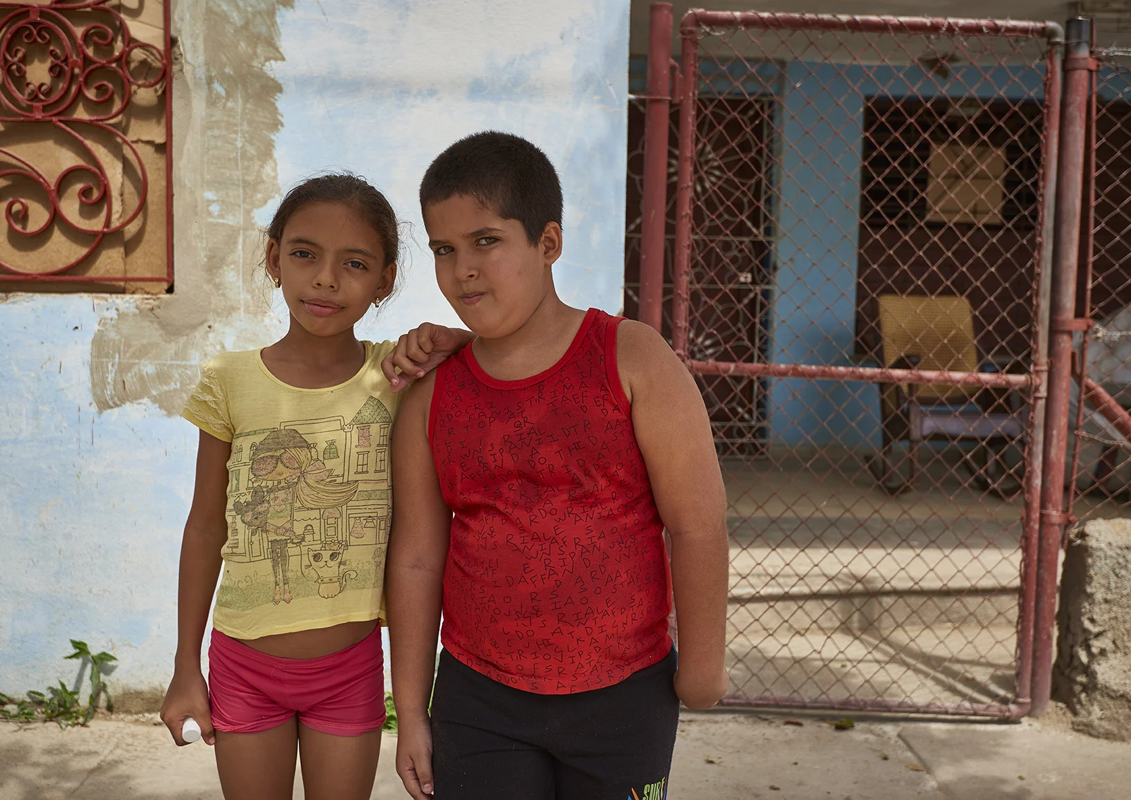 Two young friends in the streets of Cuba. 