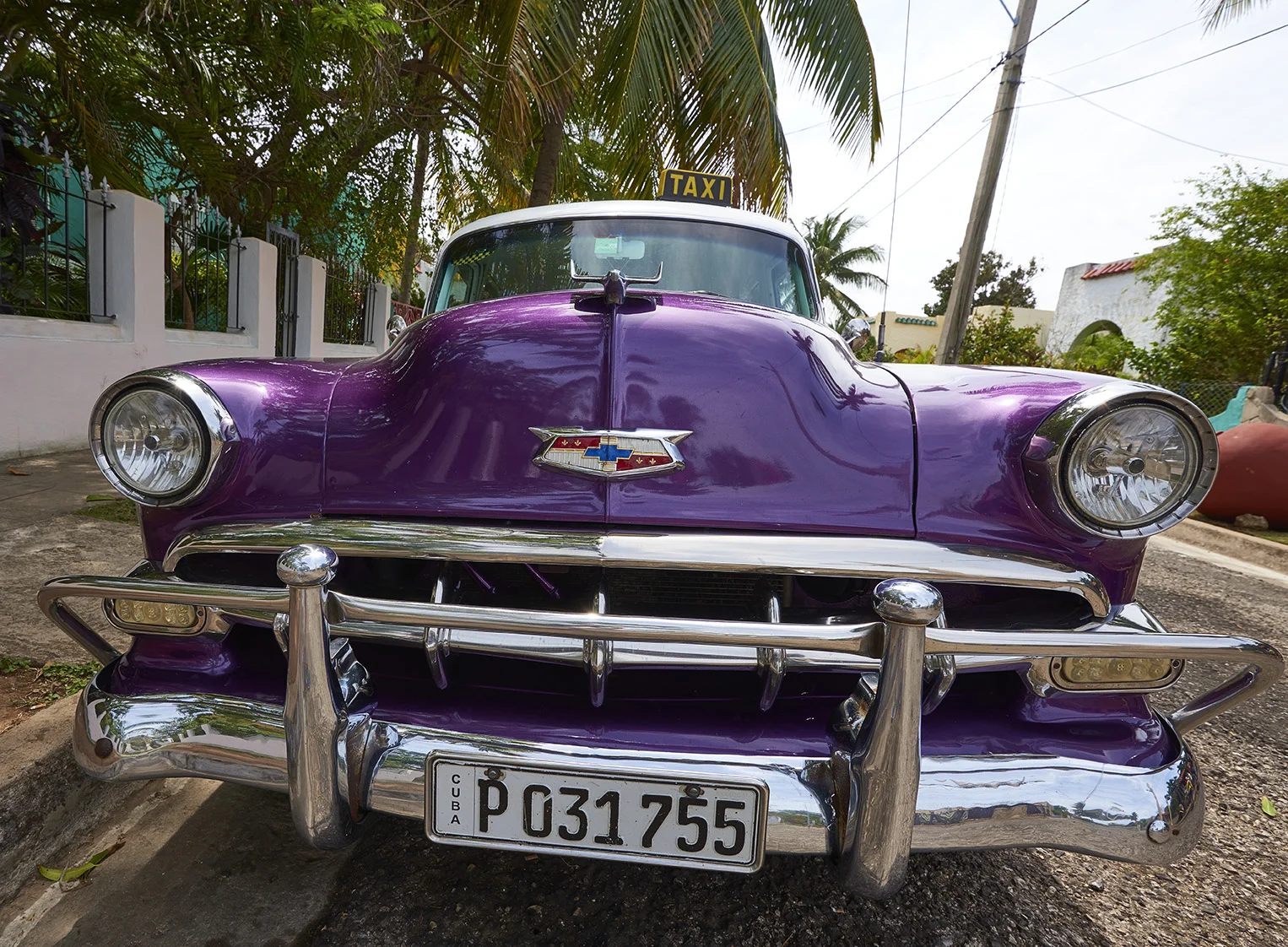 Purple vintage car in Cuba. 