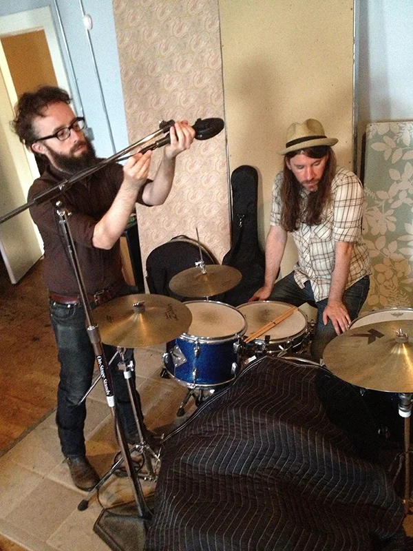Elio Deluca setting up a coles 4038 mic for Mikey Holland's drums during the Soul Shop recording session.