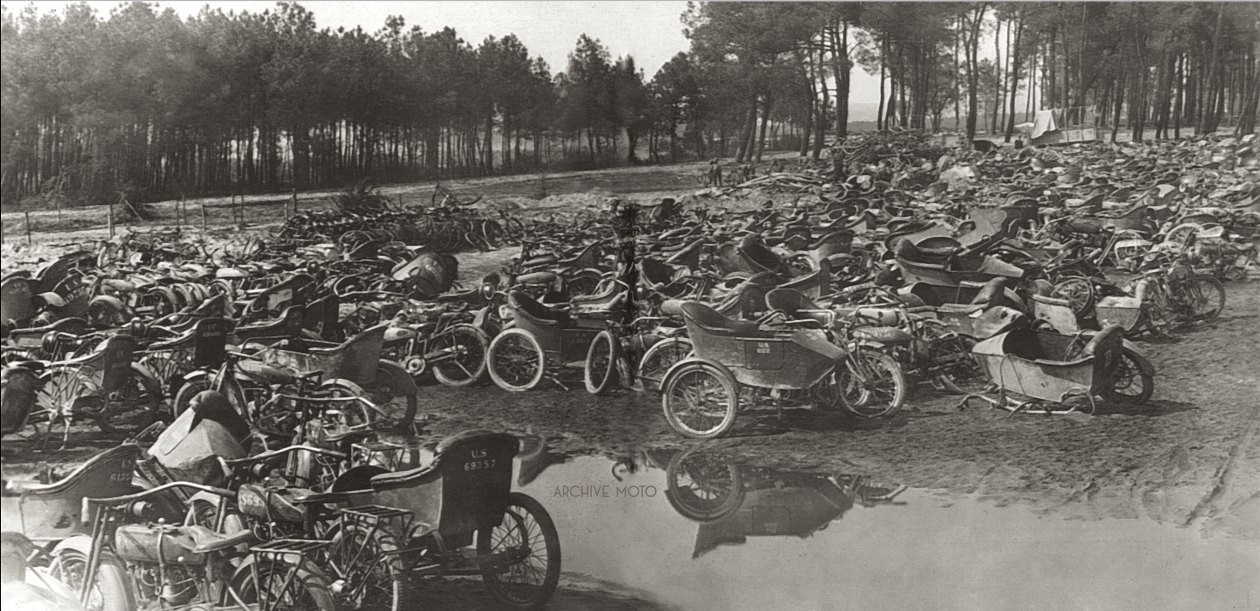 After the Treaty of Versailles was signed on June 28, 1919, the tens-of-thousands of American motorcycles, which had flooded onto the battlefields of Belgium, Germany, and France during WWI were collected for scrap or private sale. Countless mechanical boneyards like this one managed by the US Army Corps of Engineers in Le Mans, France were established to deal with countless damaged and surplus machines. Though it no comparison, the scene of so many abandoned and disabled machines heaped in a muddy French field resonates the mass destruction of such a terrible affair, a war that truly changed the world.