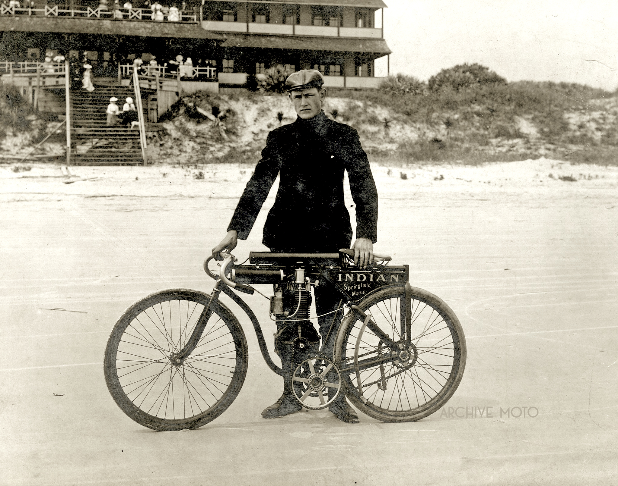 Oscar Hedstrom with his prototype racer, what may have been the very first Indian factory racing motorcycle, in front of the Ormond Hotel in late March, 1903