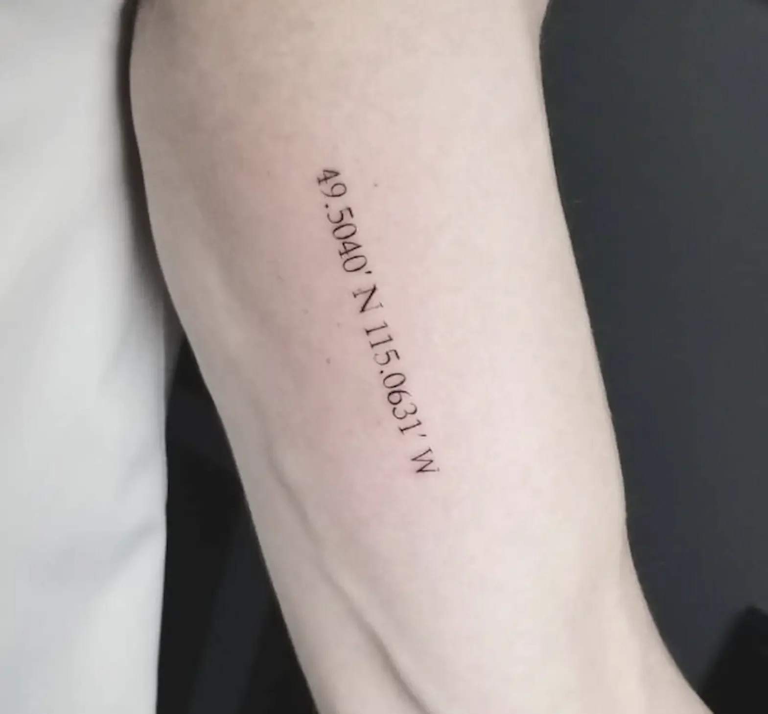 Fineline-coordinates-tattoo.webp