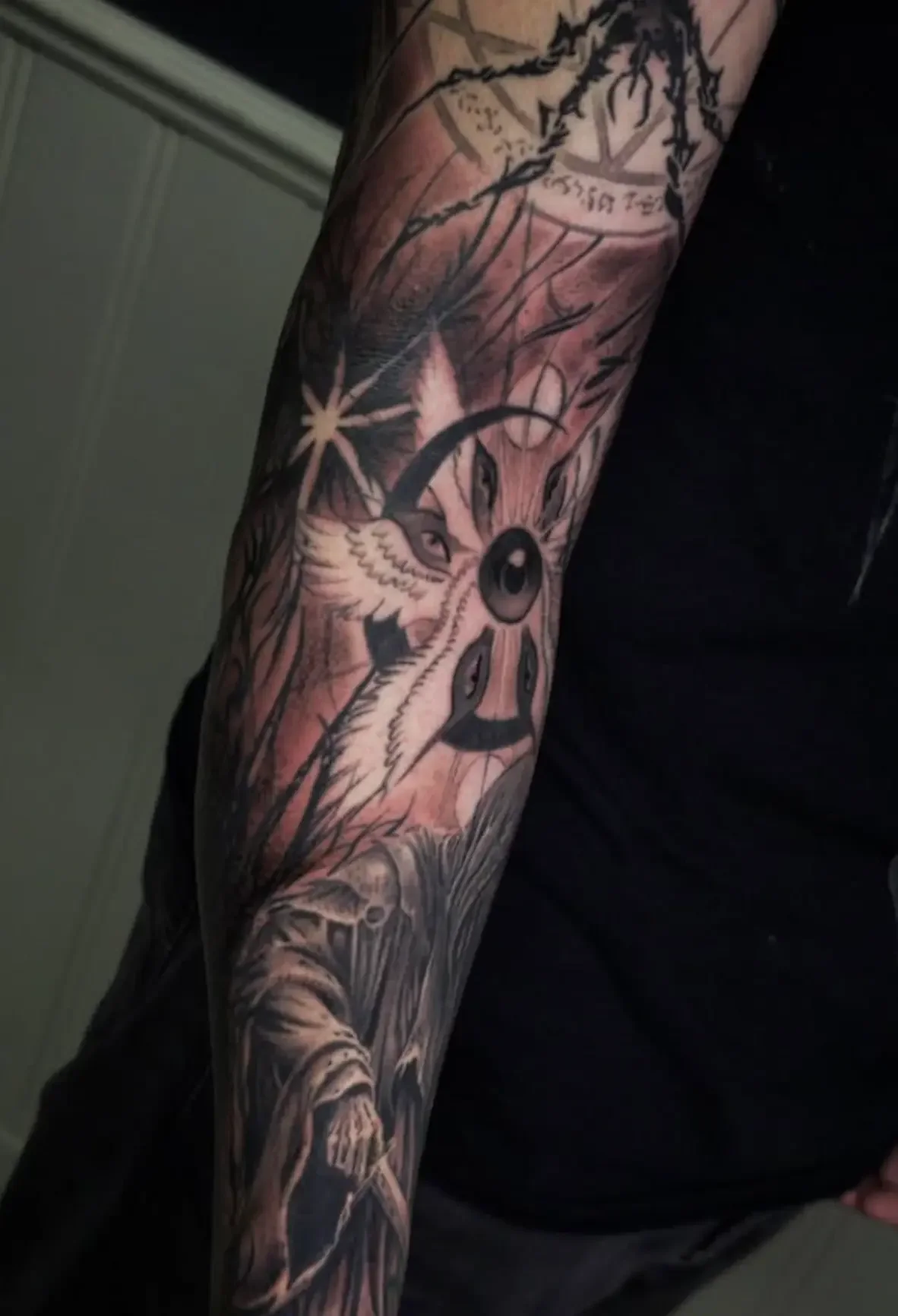 Dark-angel-sleeve-tattoo.webp