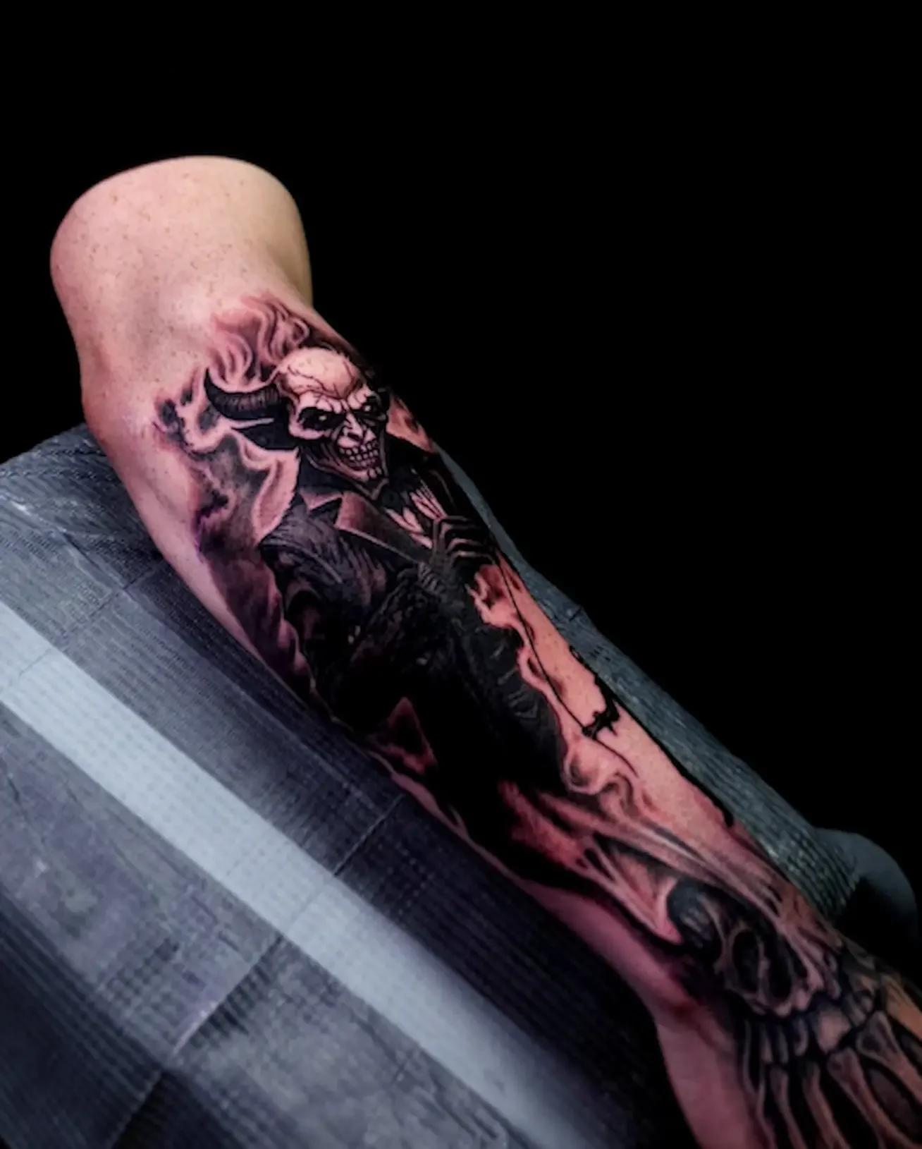 Devil-skeleton-hand-tattoo.webp