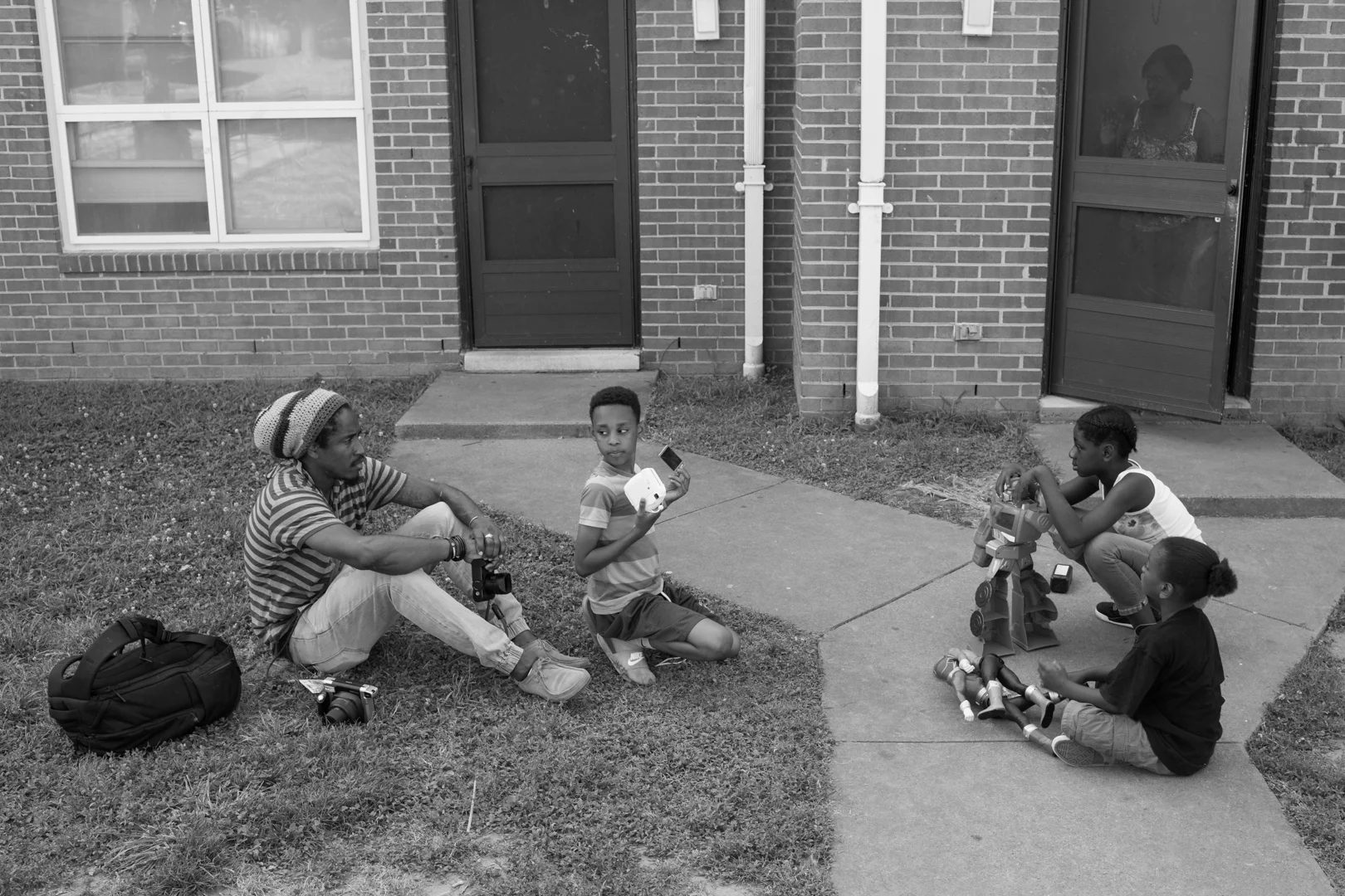 Ruddy Roye sits with kids from the Charlottesville community who participated in Ruddy's shooting workshop during the festival. Photo © Keith Alan Sprouse