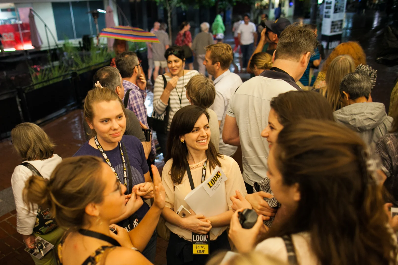 LOOK3 employees gather outside of the Paramount Theater after an artist talk. Photo © Tom Daly
