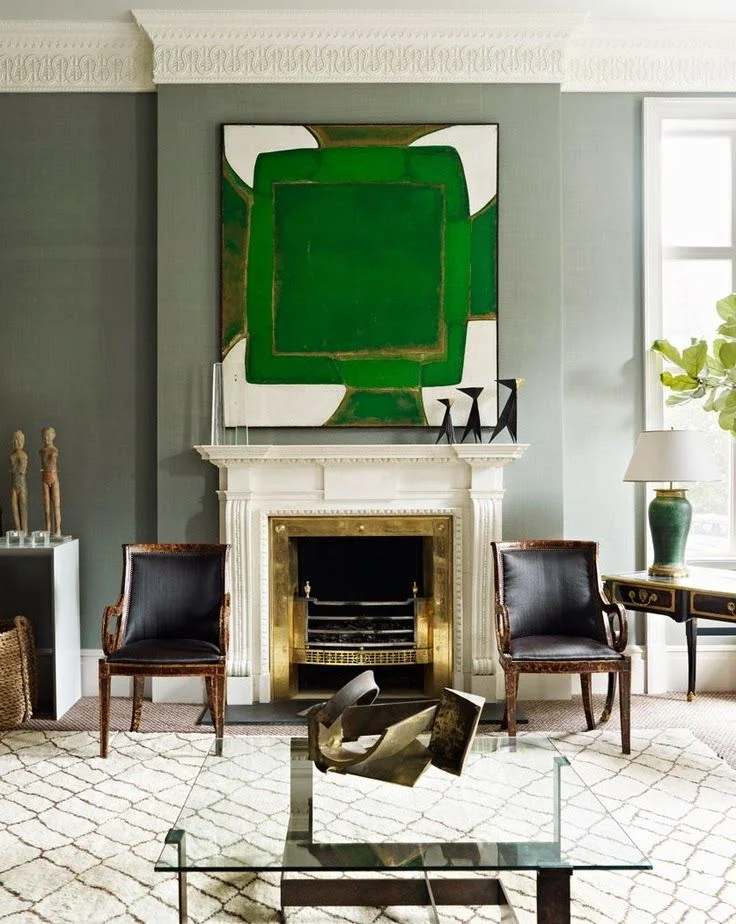 In a beautifully neutral room, why not add a bold - dramatic work of art?