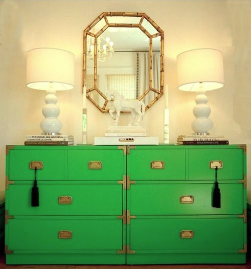 Beautiful green chests anchoring two, modern white lamps. Loving the accessories and simplicity of this room.