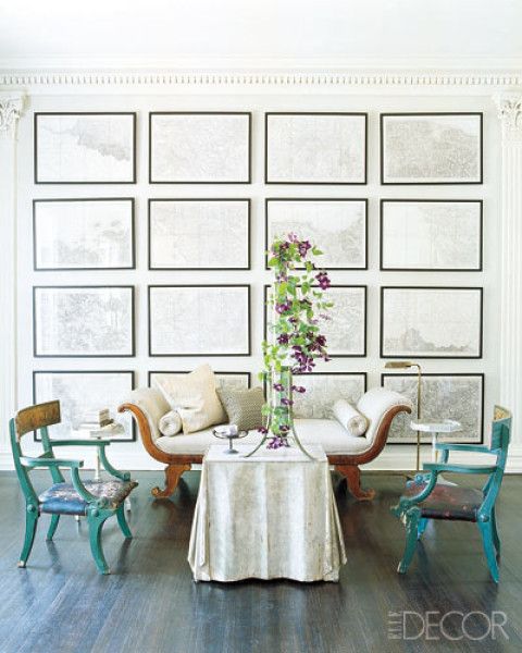 I love the idea of creating a floor to ceiling gallery wall of artwork.