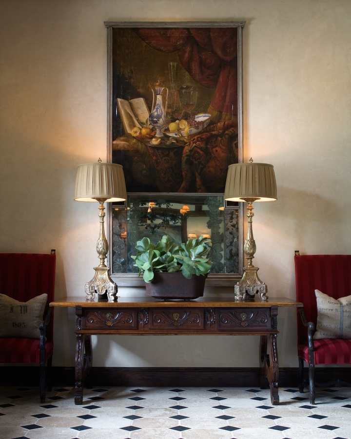 Here is a project I did a couple years back. This piece is an antique and generates vertical movement on these large walls. Anything smaller would get lost.
