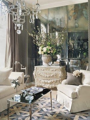 The antiquing on this mirror is very heavy and beautiful. Such authentic antiquing in an eclectic room. 