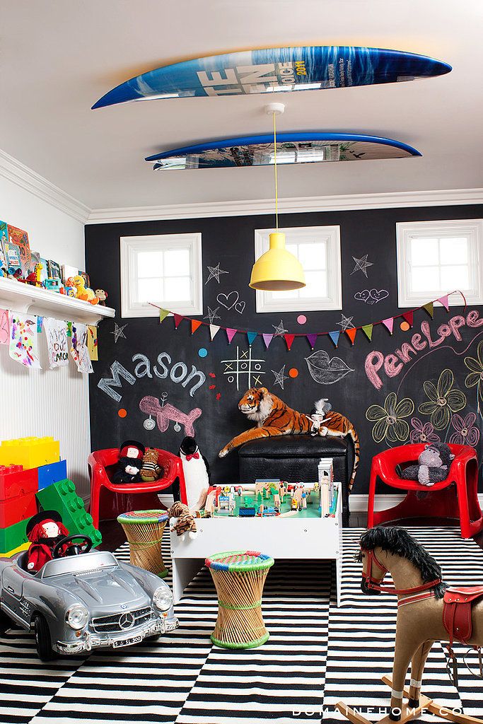 This room has personality! Love the contrast of black and white with primary colors. And this room suites both boys and girls with its theme.