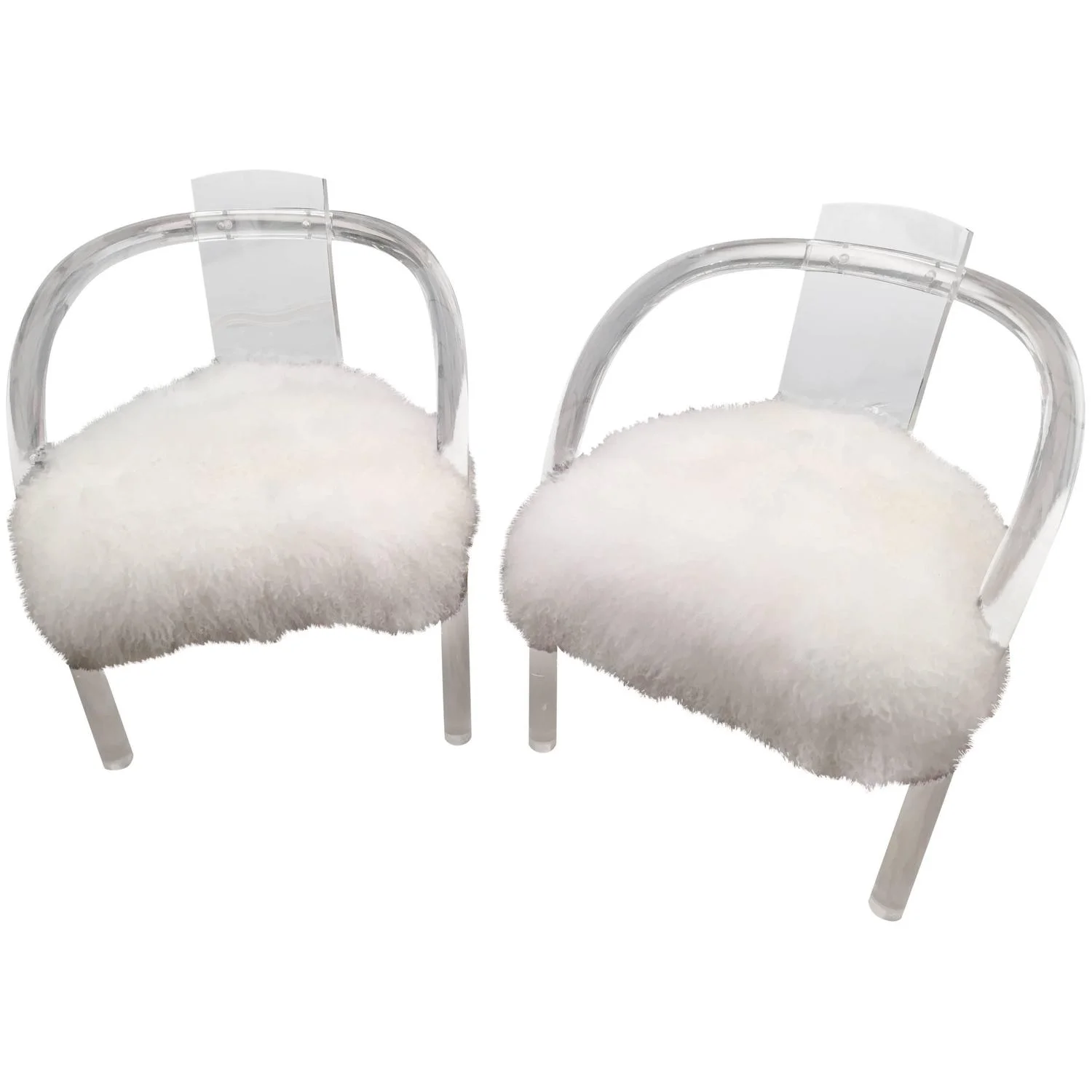 Antique Hollis Jones chairs covered in white Tibetan fur. Contrasting the modernist look with overwhelming texture. This pair available at Shop Tiffany .