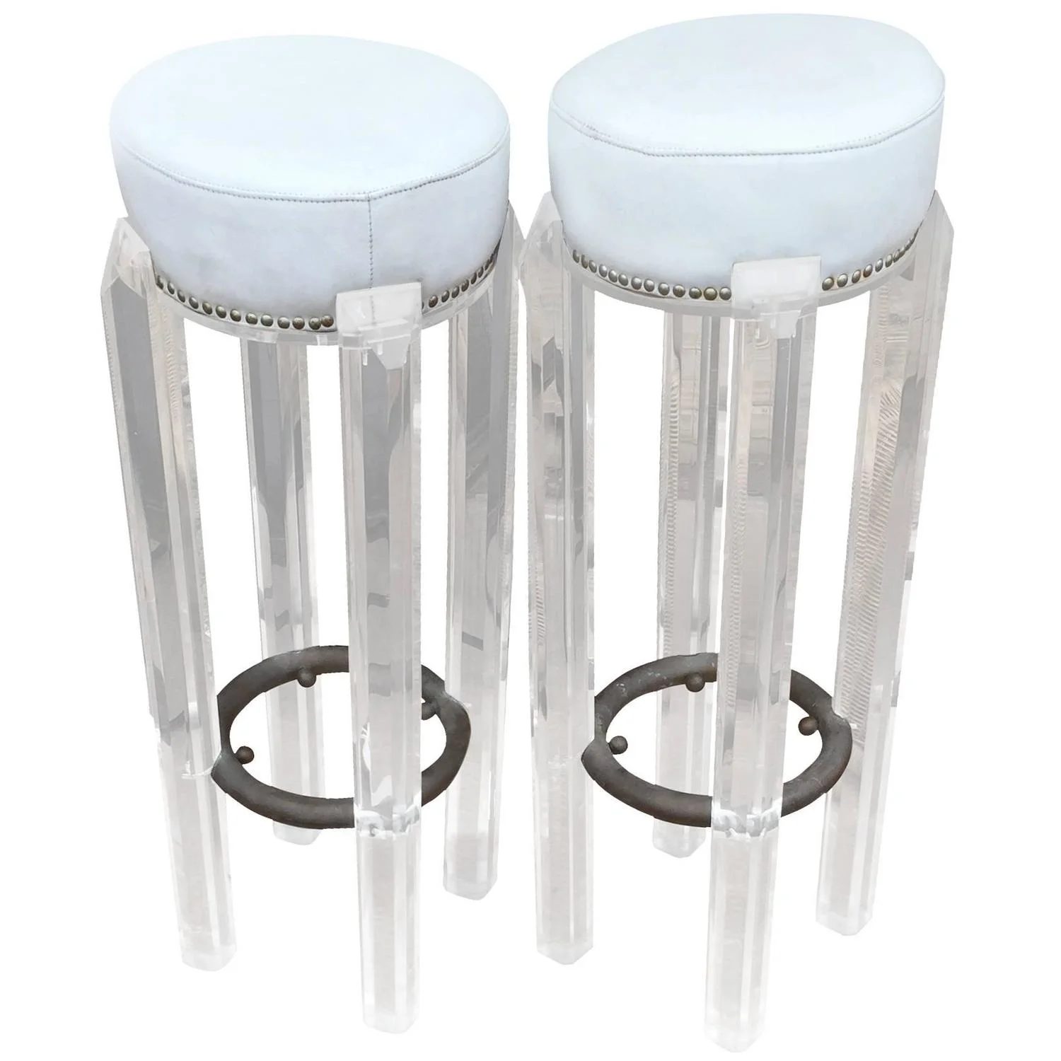 Lucite never goes out of style. These 20th Century barstools are just as funky as ever. Available at Shop Tiffany .