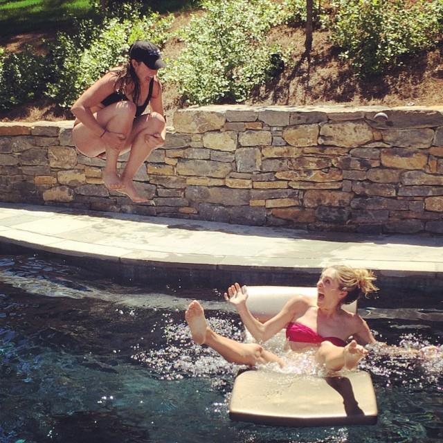 This is me cannon-balling Sammy because she cussed me out in an airport.