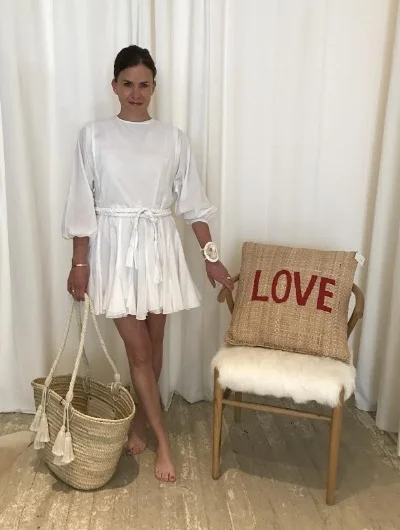 rhode resort dress, $355, phoenix two moon cuff, $425, giselle tote, $140, love pillow, $95, wishbone chair, $845