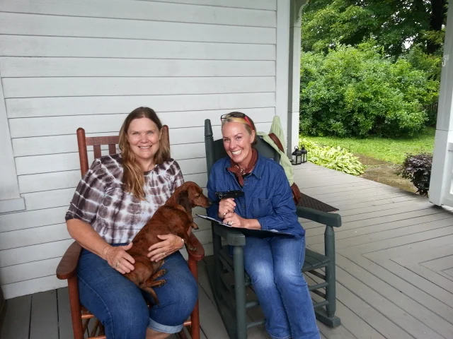 Martha Kern with Amy on the front porch of the house at Strong Stock Farm. https://www.facebook.com/strongstockfarm/