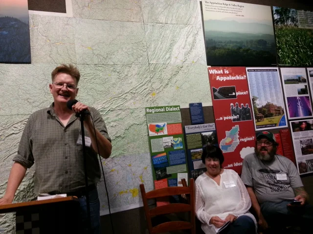 Robert Gipe tells his pickle factory story at the 3rd Appalachian Food Summit while Elizabeth Simms and Travis Milton listen.