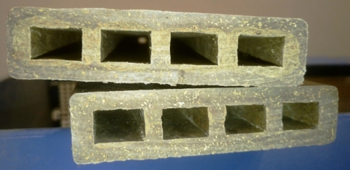 Hollow decking boards with thermoset FRP-waste (1/3) + wood fibres (1/3); on top multilayer with PPr (1/3) at core and HDPEr (1/3) at surface / on bottom single layer in HDPEr (1/3)