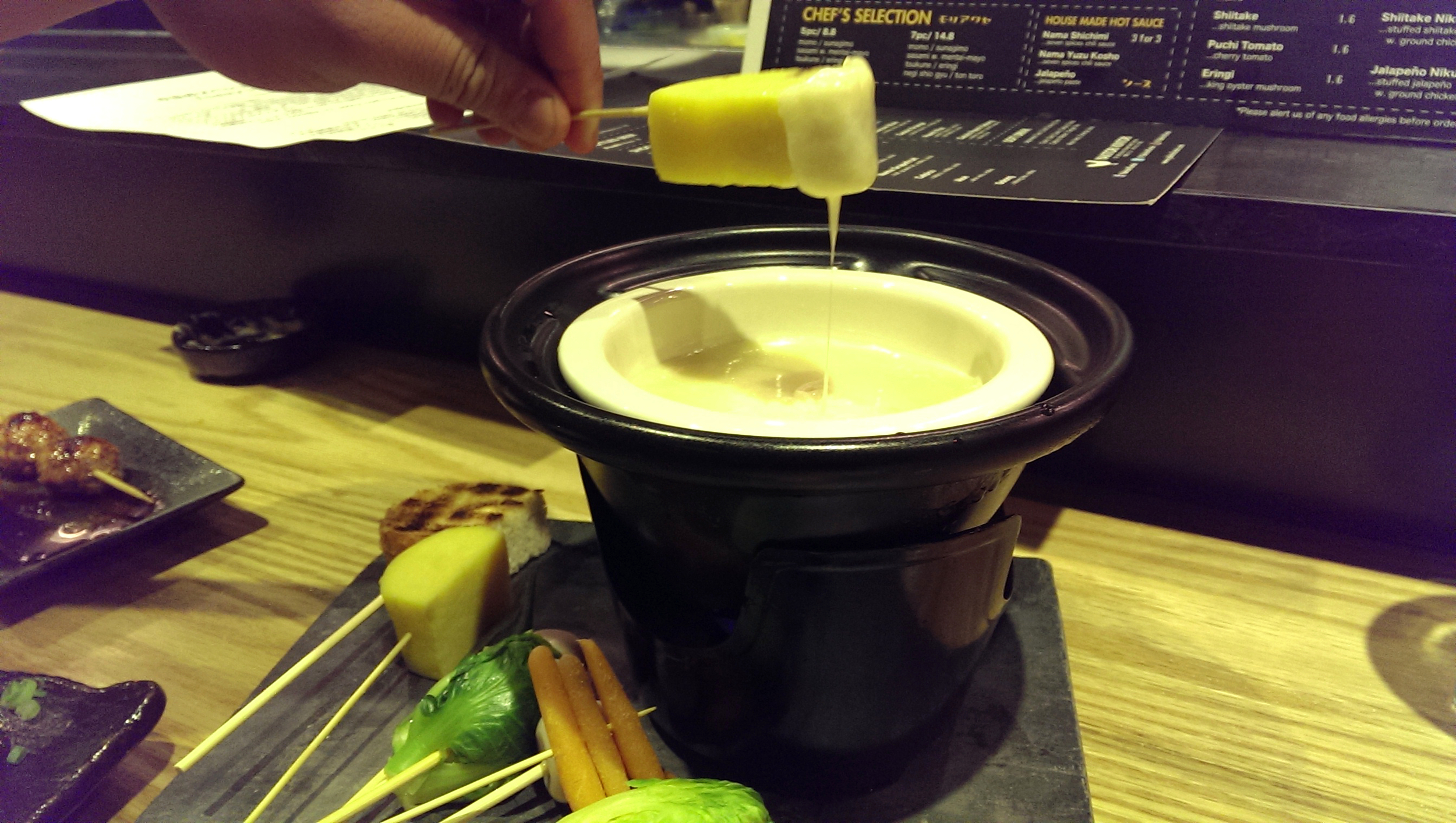 Sake Cheese Fondue (swiss cheese, sake, assorted skewers)