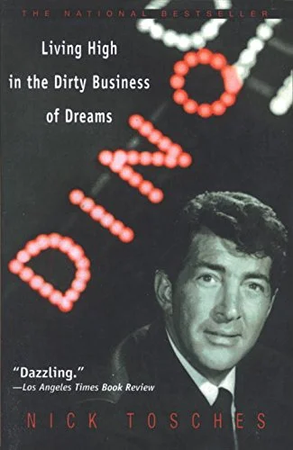 Dino: Living High in the Dirty Business of Dreams by Nick Tosches You wouldn't think that the easy-going life of Dean Martin, who skated through a haze of booze, broads, and untold millions with a wink and a shrug, would provide such depths, but for Tosches, drawn to his broody loneliness and his effortless, Old World masculinity, he's the dream subject. His research was tireless—he got everybody to talk and found out how much Dino was paid for every gig, from small-time Ohio roadhouses to his soused, self-mocking headlining at the Sands—and those concrete details ground his lyrical descents into the abyss of Dino's nihilism and make them as devastating as his fantastic subtitle promises.
