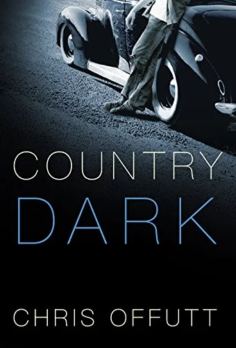 Country Dark by Chris Offutt Country Dark is the first fiction Offutt, who in his youth was compared to Tobias Wolff and Raymond Carver, has published in twenty years, and it shows. Not because it's an encyclopedic novel packed with two decades of material, but the opposite: it's a tale that has been pared back by a master to only the most necessary and vivid words and moments. Beginning when Tucker returns, still young, from the Korean War to his home in the hollers of Kentucky, he finds his life overturned again and again by love and by threat and by his own often violent decisiveness. Call it "country noir" if you like; I call it a thrilling, thoughtful page-turner and one of the best books I've read this year. 