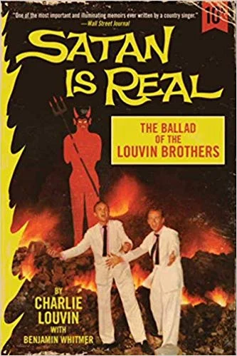 Old Book of the Week (April 23, 2019) Satan Is Real: The Ballad of the Louvin Brothers by Charlie Louvin Any expectations that a memoir by a member of a legendary gospel country duo might be squeaky clean ends on its first pages, with Charlie's foul-mouthed account of kicking his older brother Ira's ass after he drunkenly slighted their mom. The book proceeds from there, a two-fisted tell-all that sometimes reads a little like an Opry version of Motley Crüe's The Dirt but is an eye-opening and compulsively compelling story, full of insights into the desperation of a hardscrabble upbringing, the relentless, road-weary struggle of building a country music career in the '50s and '60s, and the fiery creative collaboration behind the strange, mournful harmonies of the Louvin Brothers. —Tom