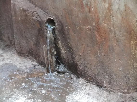 Waste water is discharged directly to streets. (Photo credit: Joan Rose)