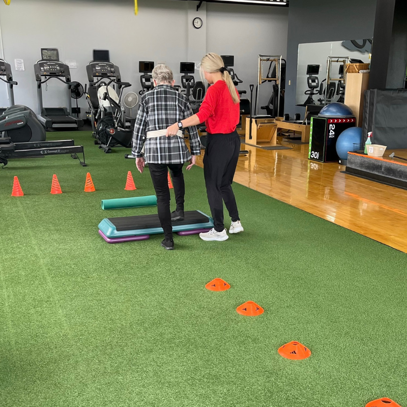 Dr. Rachael Brochtrup, PT, DPT, working with a patient on balance and falls prevention at our physical therapy clinic in Fond du Lac, WI.