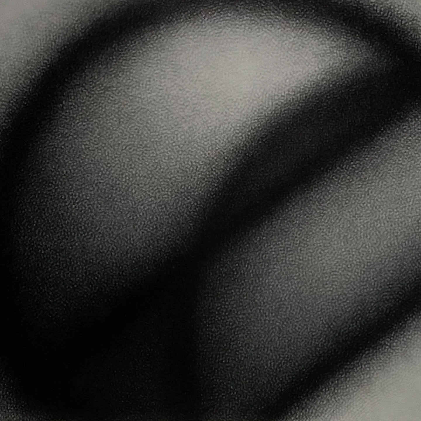 "Long Shot" by Jack Scott. 
He created it by using charcoal, cross hatch, free hand arches. It's the same motion throughout the piece but in different directions and tighter in some places. 

The piece was created in the early 1970s. Jack c
