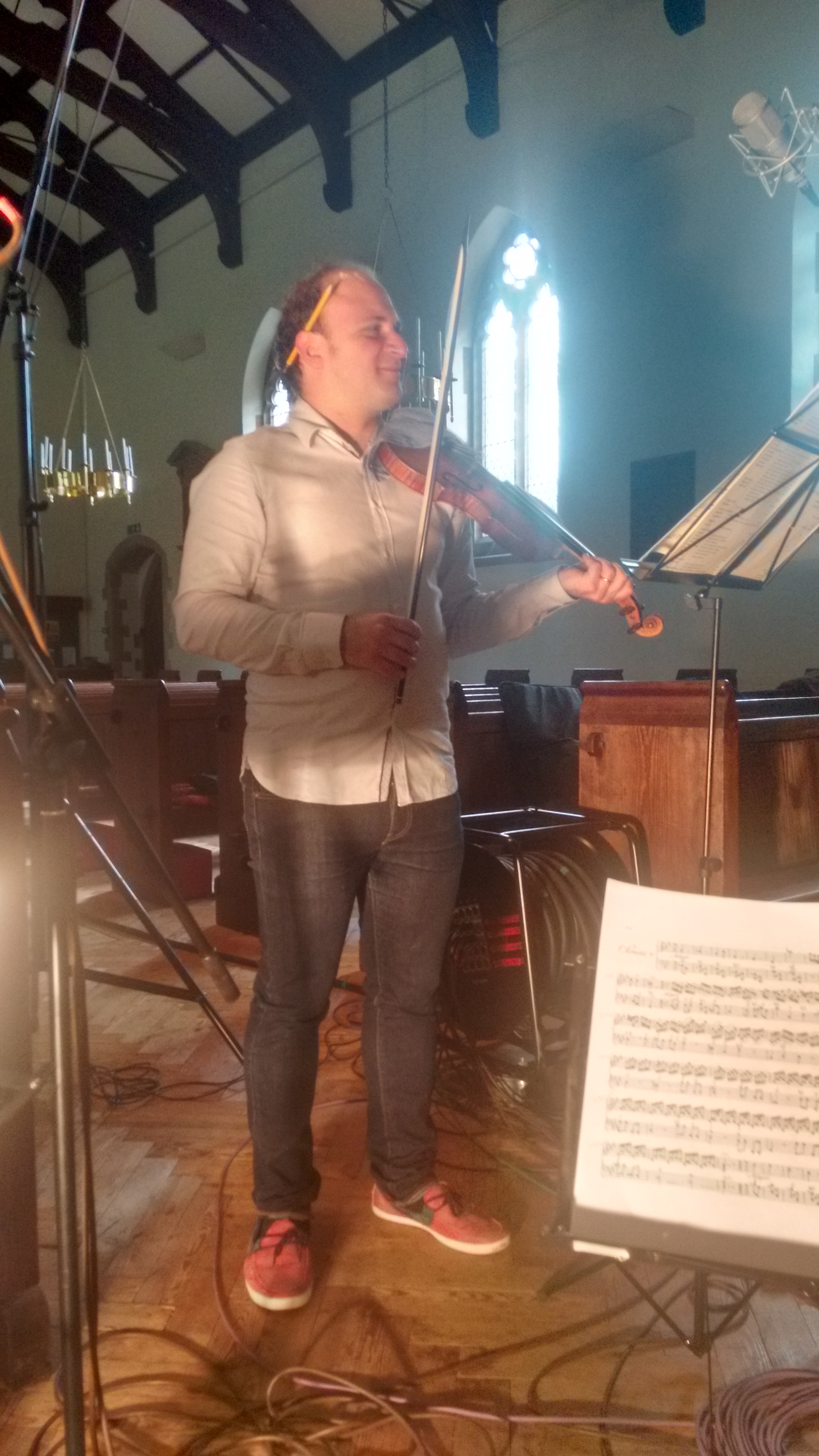 Sonata No. 5 just visible on the music stand. 