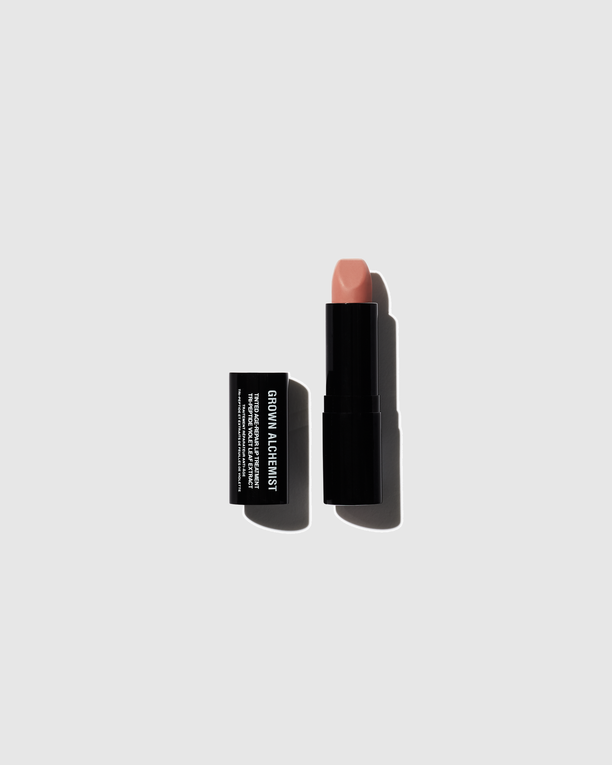 grown alchemist tinted age repair lip treatment