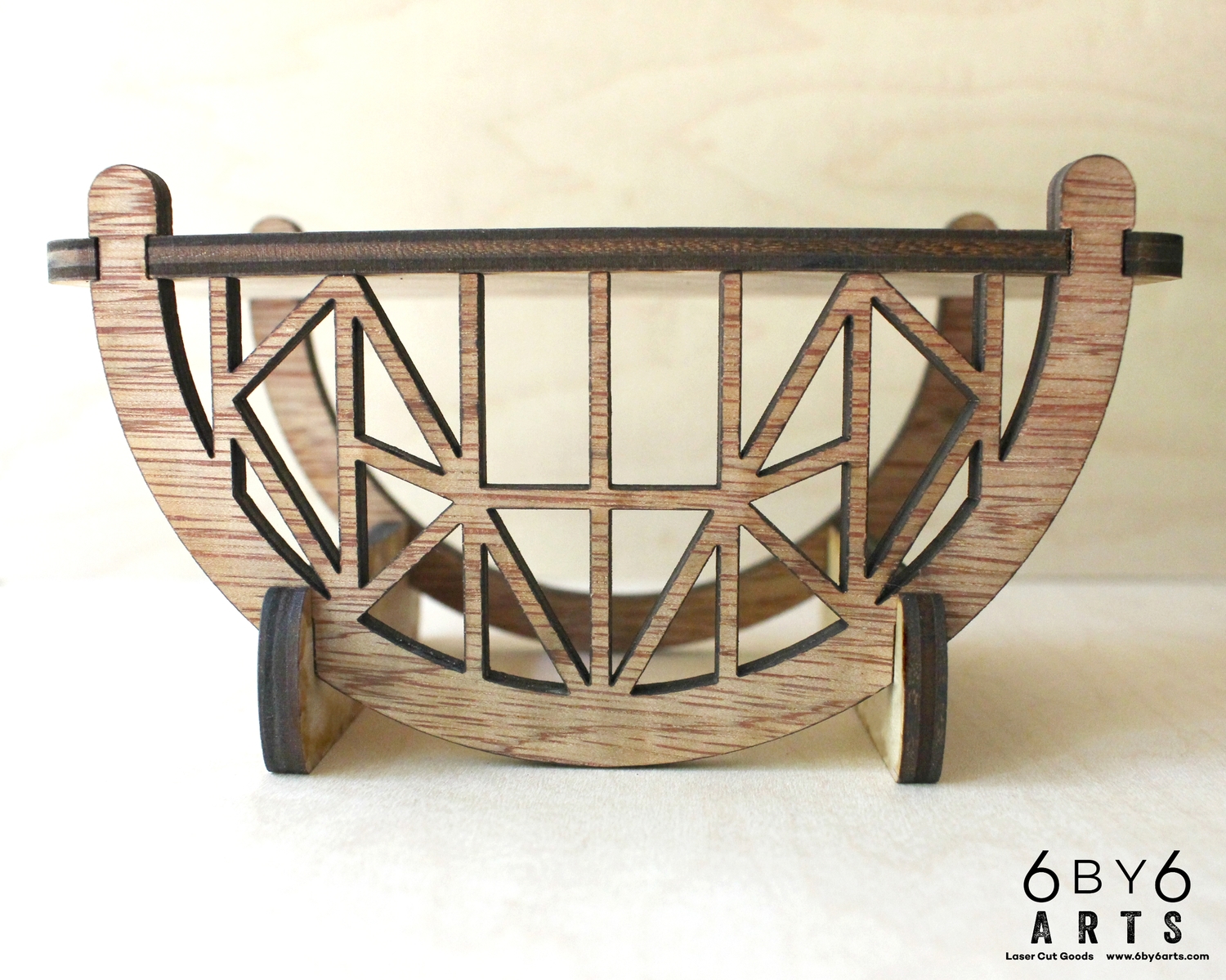 A desktop cellphone shelf we designed a while back, based on the architecture of the Deception Pass Bridge. 