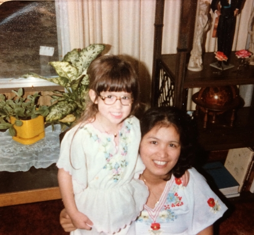 Bonus photo of my mom and I in full one boho mode wearing tops from the Philippines. But notice the yellow planter, compare it to the one in the above photo. Same plant - one year difference. My mom is a plant whisperer. 