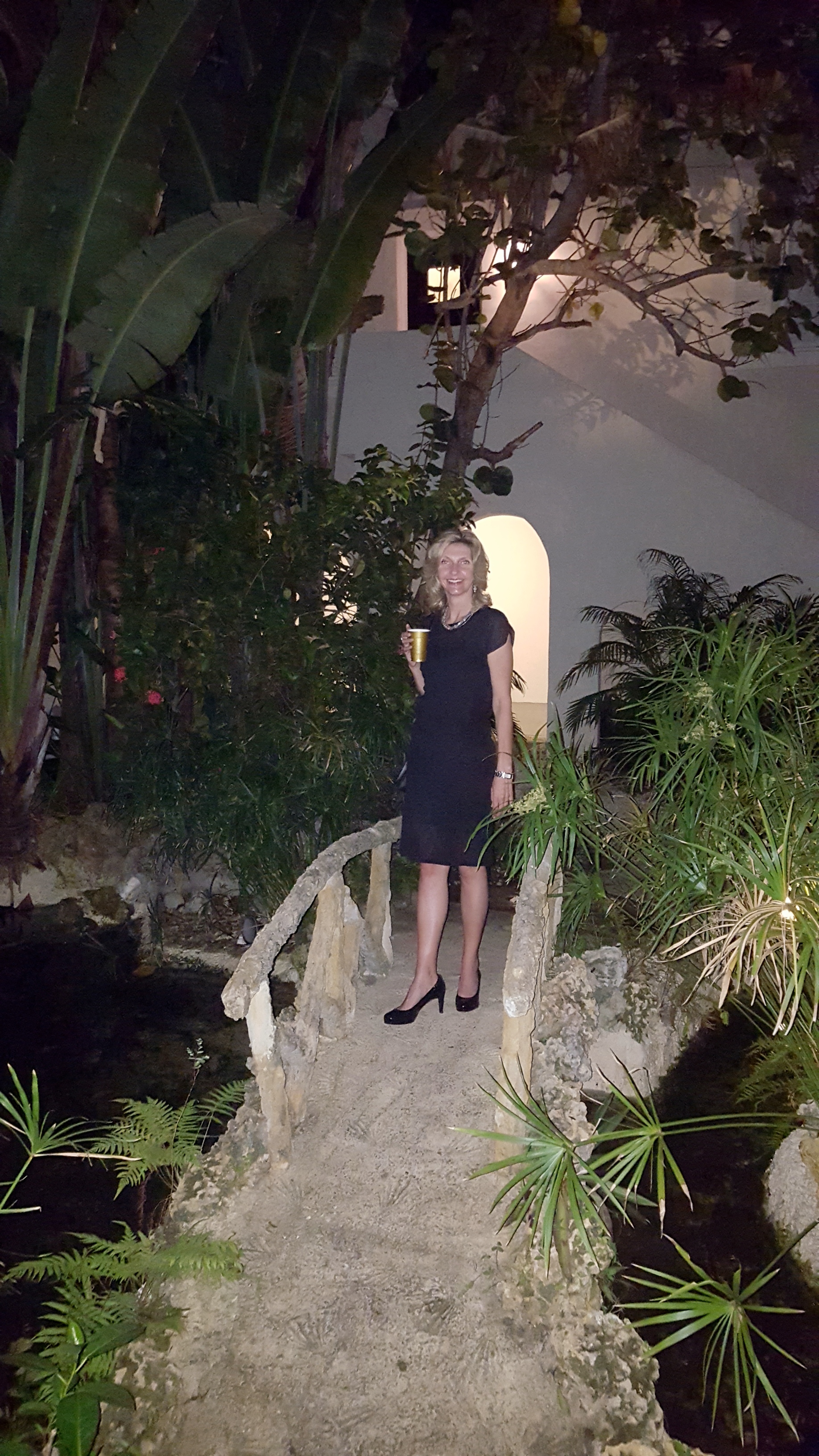 One area of the grounds at 93 Palm is a red coral grotto. 