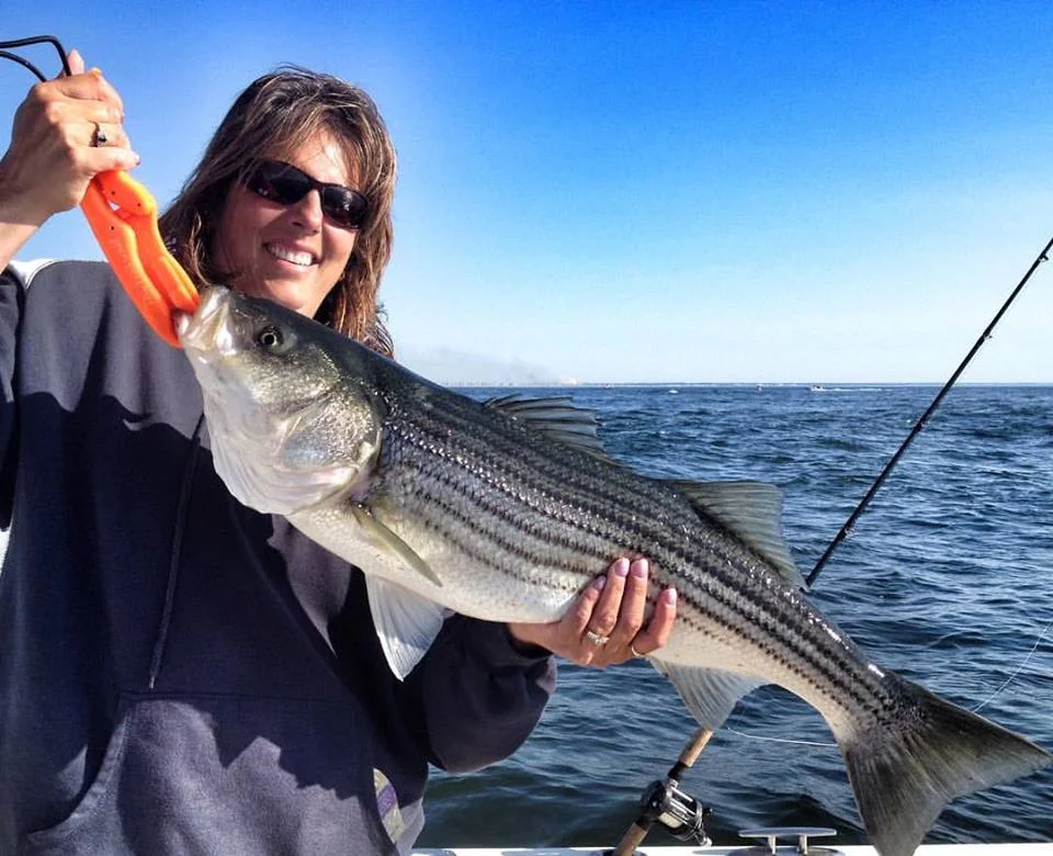 Michelle and her family came back for a third straight year and had 6 keepers, all released, including this 35" in the Merrimack River on their charter