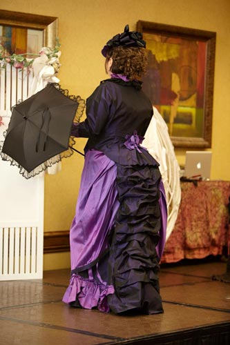 Beth's favorite color is purple, and you can see why. She looks marvelous in it!