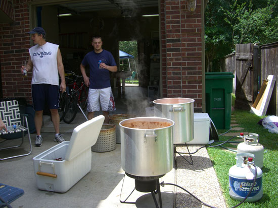 This is the cook's set up. This year the next generation showed an interest in learning how to cook the crawfish. By the end of the day, our oldest son and nephew (on the right) were doing all the cooking. This allowed Greg to do much more visiting and relaxing. It was so nice!! :)