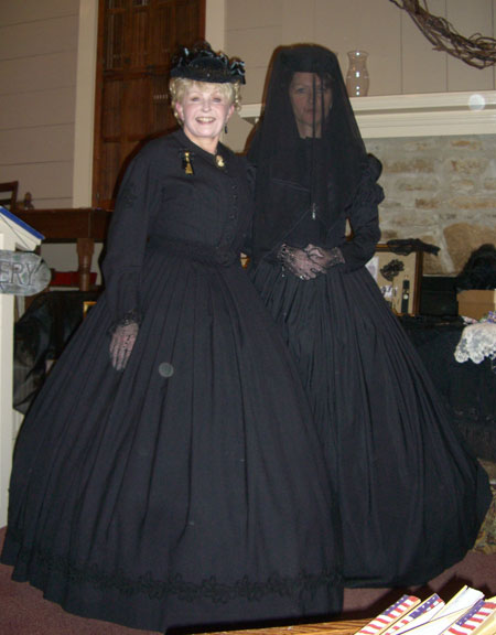   One of the presenters was "The Victorian Lady." Ohmigosh. We all fell in love with her. She came in costume. Here is a picture of her and one of her models in Victorian mourning costumes. The Victorian Lady (and speaker) is on the left. The model i