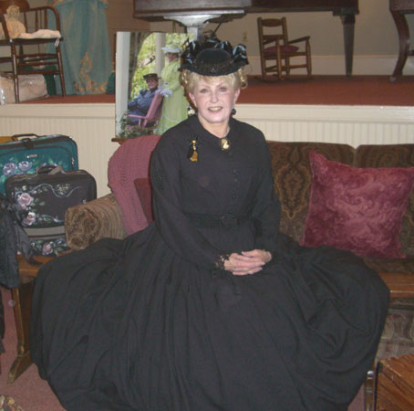 Cathy Marie Hake insists that corsets that fit correctly are great for back support. I can tell you this, they certainly do make for pretty posture--as you can see with our Victorian Lady!