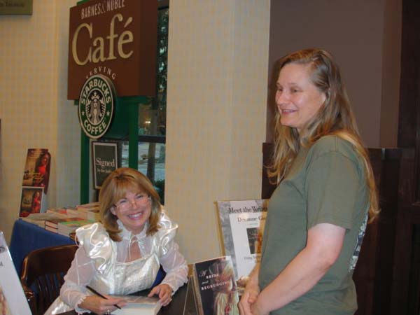 Signing *A Bride Most Begrudging* for an aspiring writer.
