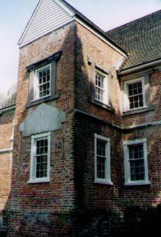   This is Bacon's Castle and according to Preservation News, it is the "sole surviving high Jacobean manor house in America." It is located in Virginia and was built in the mid-1600s. So, I used it as a model for the "big house" that Drew builds. Ove