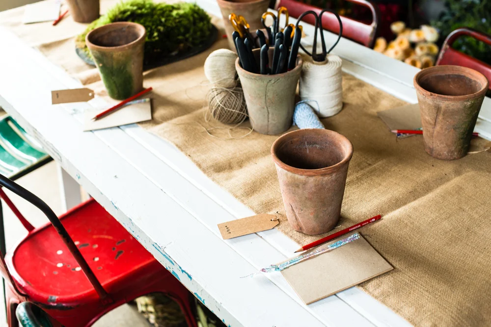 moss, pots, string, and handmade notebooks...