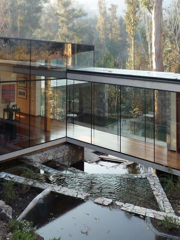 Glass walled mansion in forest ITCHBAN.com
