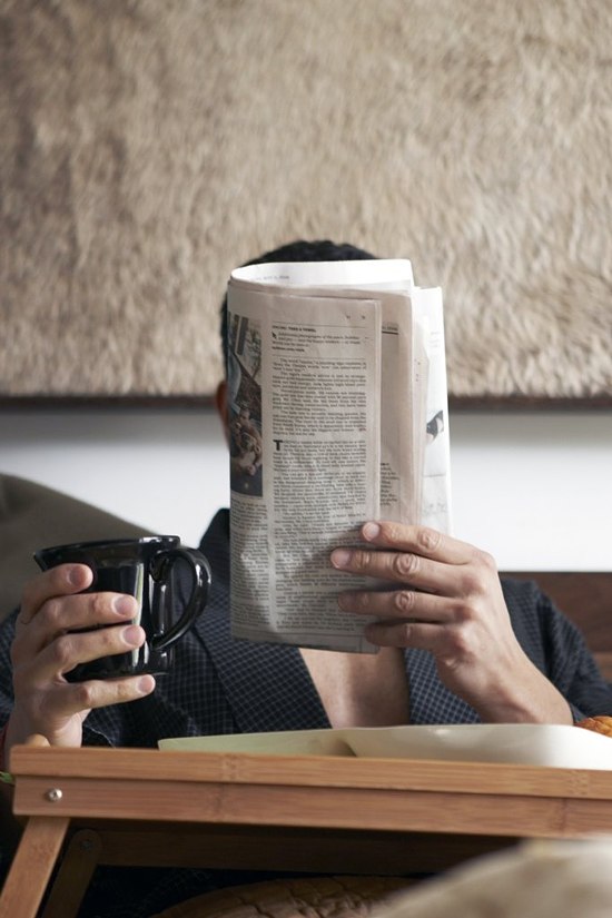 Reading the paper in the morning with coffee ITCHBAN.com