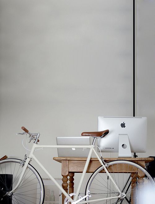 Bicycle leaned on iMac work station ITCHBAN.com