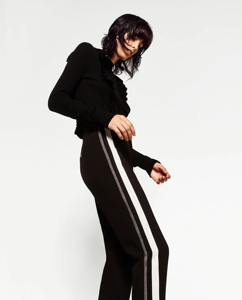 This 'new basic' ruffle jumper looks minimal but is an interesting way to wear a jumper and trousers. Who would have thought wool ruffles and stripes would work? And for those of you who do have a corporate life...work these into your wardrobe this season. By Haider Ackermann - an expensive way to work the trend.
