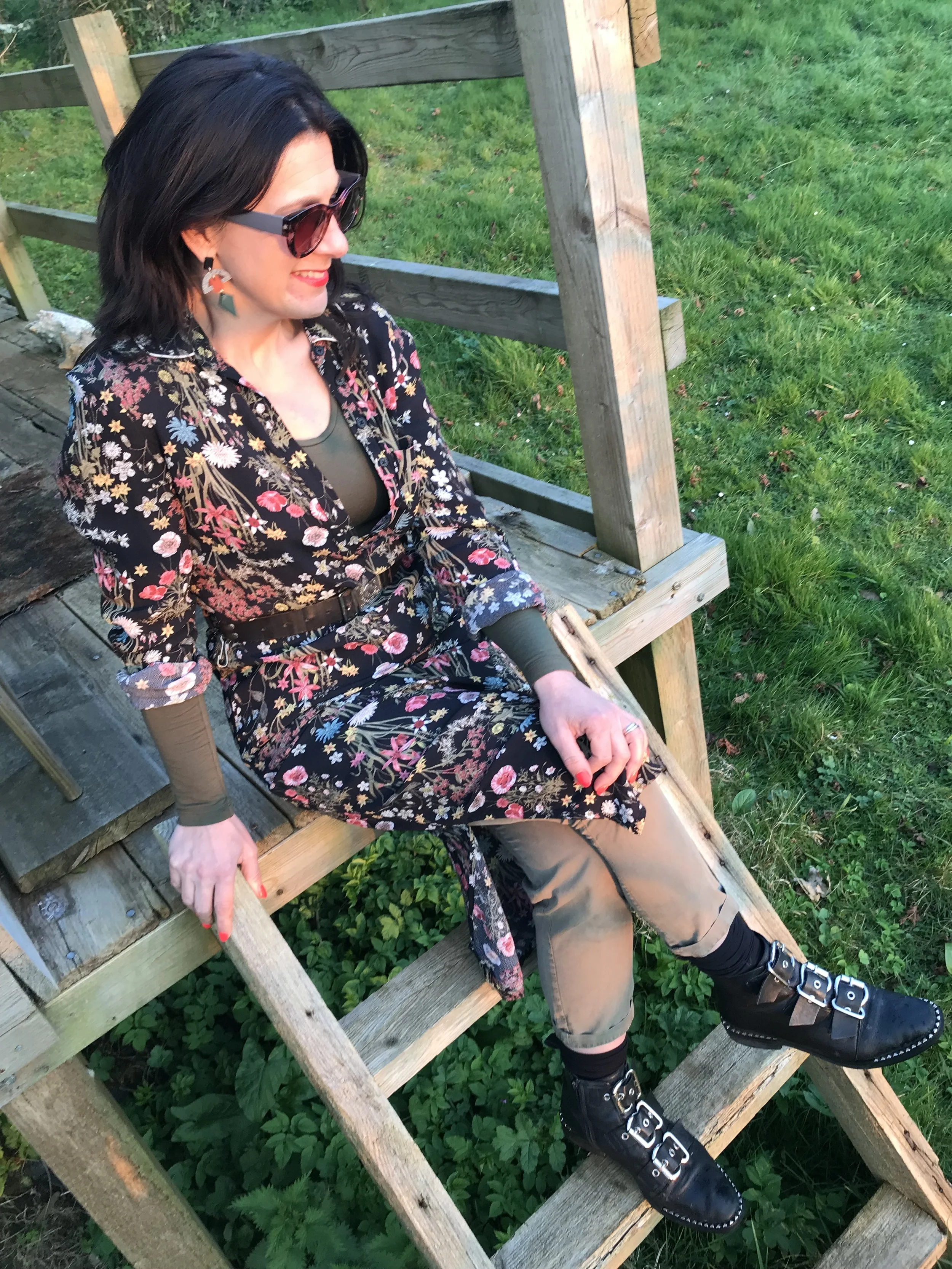 A floral midi over khaki mixed with biker boots