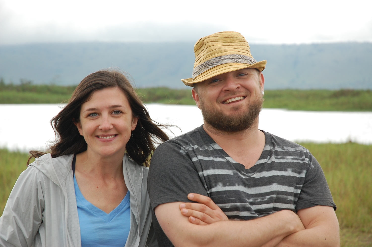 Me and Aaron in Rwanda . Fun Fact: there were HIPPOS in the lake behind us!